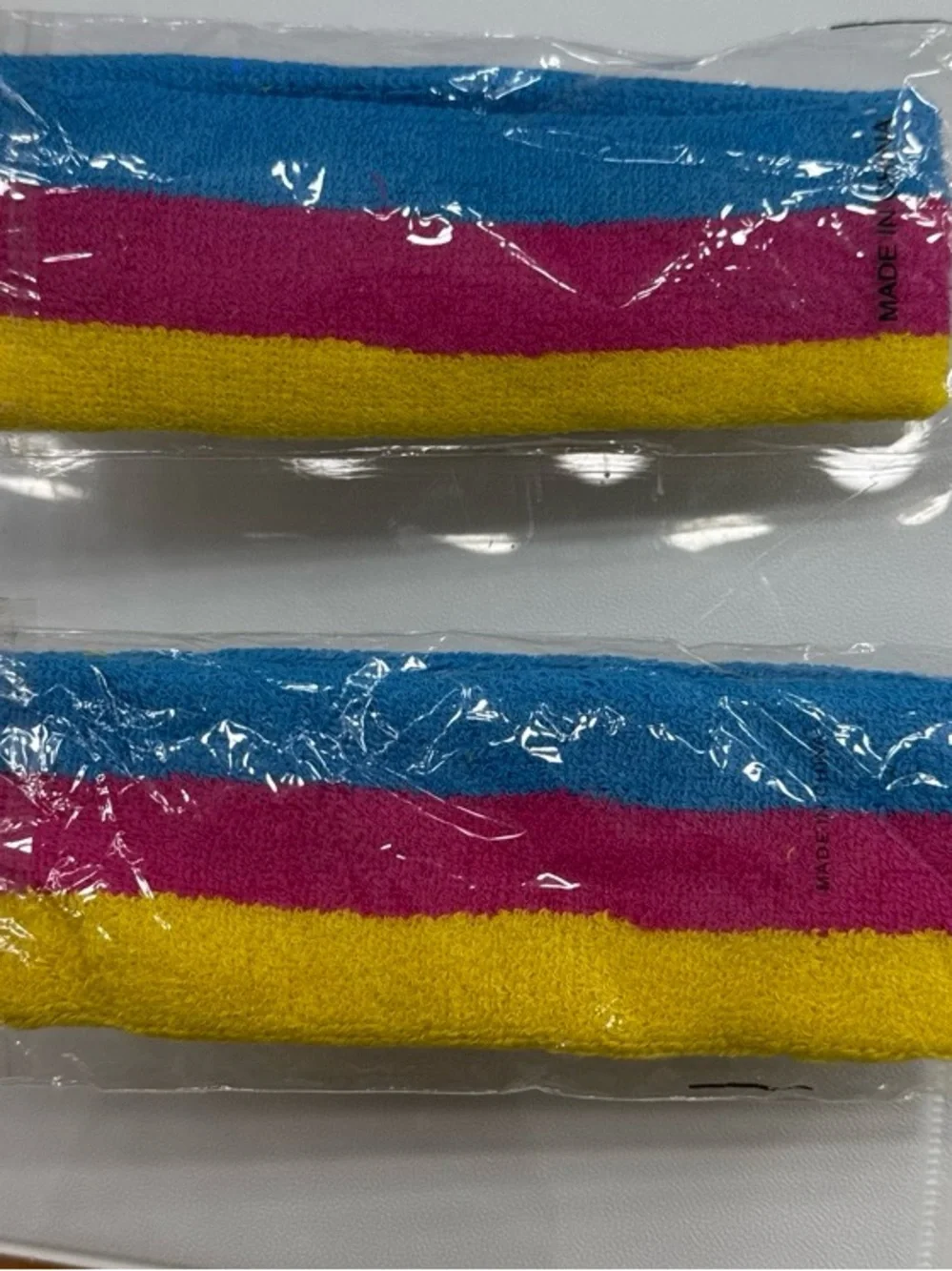 Bright Pink Kids Knit Leg Warmers with Rainbow Striped Wristbands